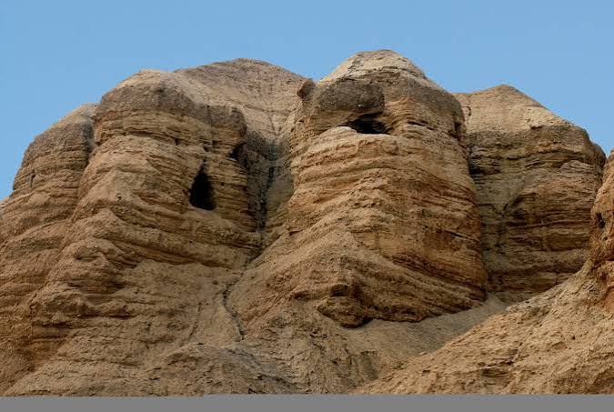 The Qumran caves in the Judean desert cliffs above the Dead Sea